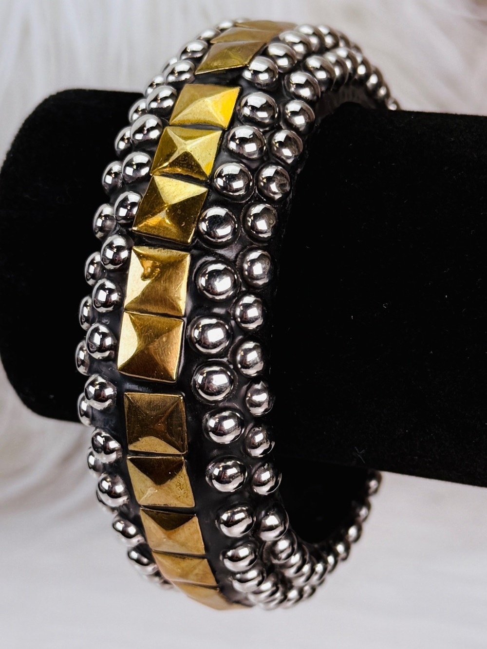 Vintage, unique chunky black with brass & silvertone studding bangle bracelet